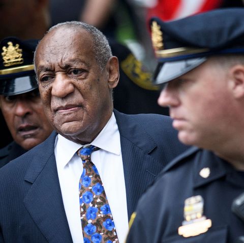cosby in a suit on the way to court