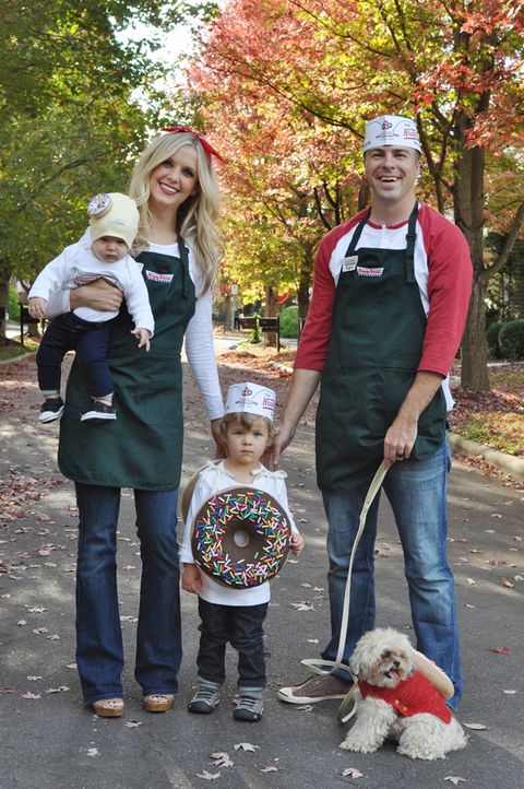 family dressed in krispy kreme costume with kids and dogs as donuts