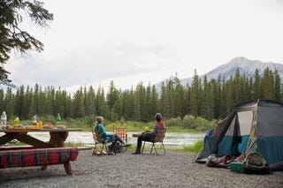 Couple admiring view from campsite