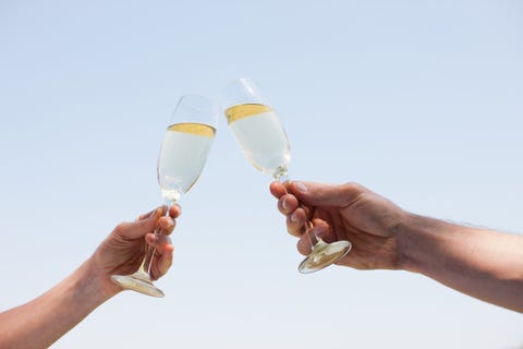 couple drinking champagne and toasting