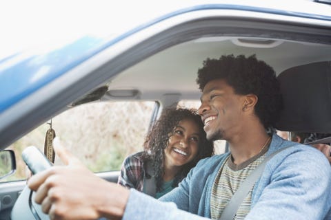 couple driving in car