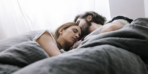 Couple sleeping in Bed together