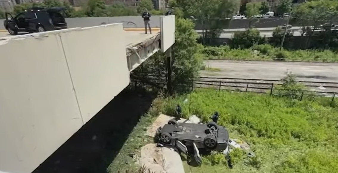 Porsche Crashes Off Rooftop Parking Garage, Wads of Cash Found Atop Wreck