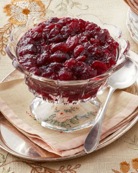 instant pot cranberry sauce in glass dish with spoon