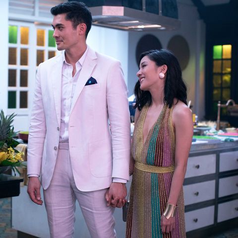 scene in crazy rich asians where is wearing a rainbow dress to meet the young family
