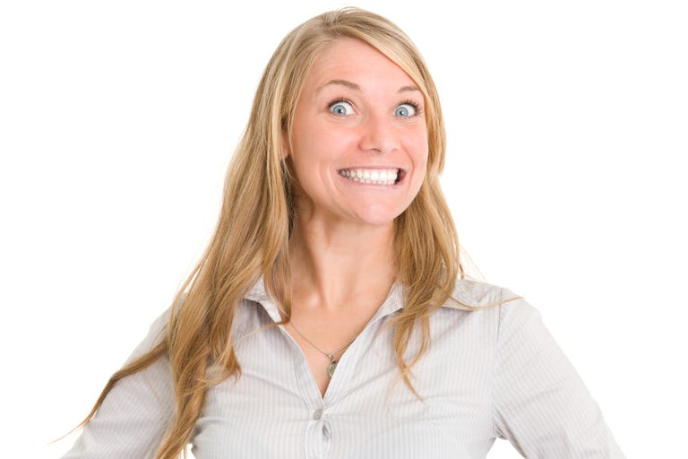 https://hips.hearstapps.com/hmg-prod.s3.amazonaws.com/images/crazy-smiling-woman-royalty-free-image-185120177-1555322586.jpg?resize=768:*
