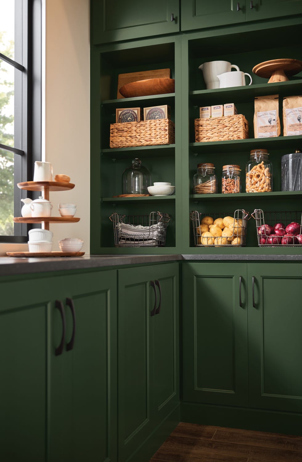 green cabinetry in kitchen