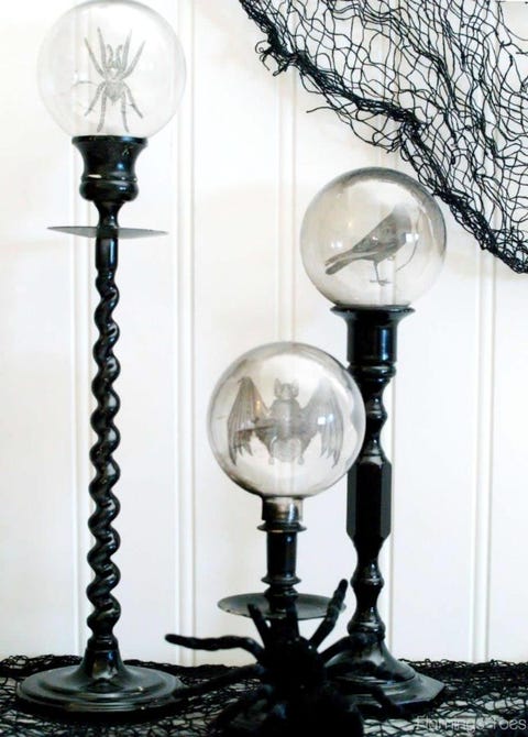 Light fixture, Lighting, Lamp, Lighting accessory, Candle holder, Iron, Table, Lampshade, Room, Material property, 