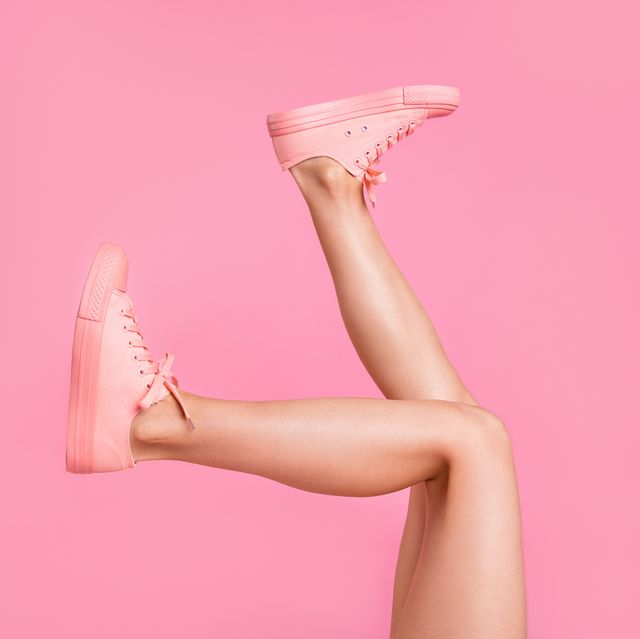 Cropped image view photo of nice attractive feminine girlish long fit slim thin shaven legs active sport walk go funny steps comfort zone isolated over pink pastel background
