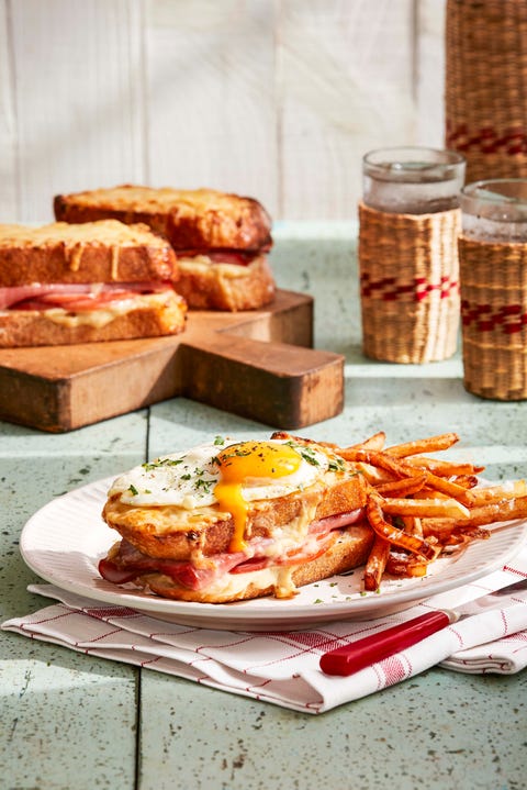 croque madame sandwich on plate with fries