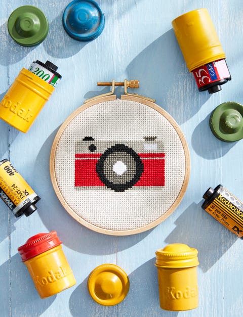 cross-stitch-camera-pattern cross-stitch camera with vintage film containers