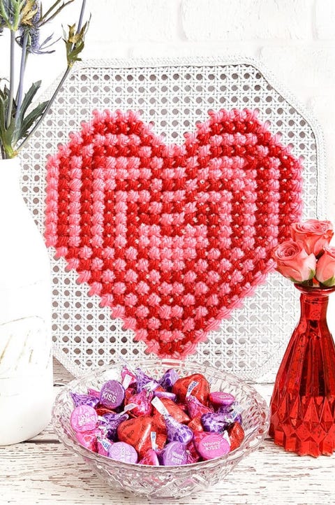 cross stitch heart on cane webbing