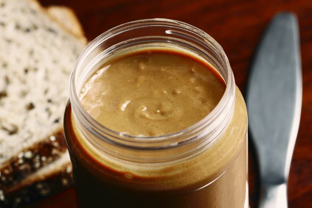 a jar of crunchy peanut butter