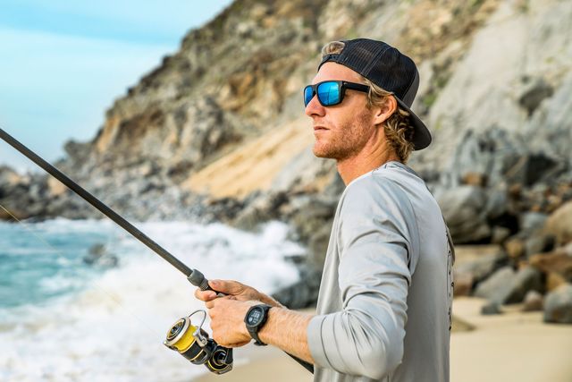 man wearing costa lido sunglasses while fishing
