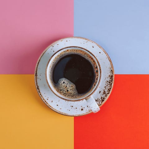 Cup of Coffee on colored background