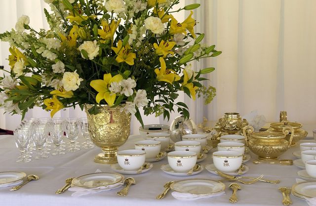 flowers and tea cups with cypher