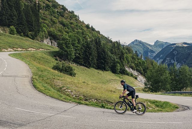 cyclist on hairpin bend on col de corbier
