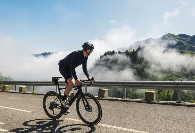 cyclist on the col de la colombiere in the french alps