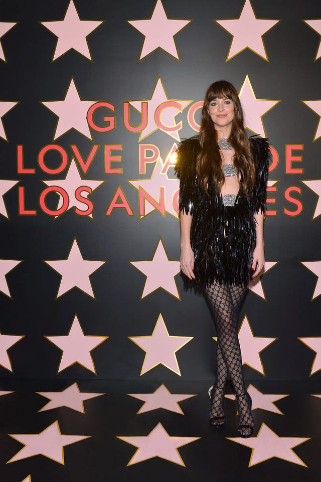 Dakota Johnson’s Abs And Legs Looks So Toned In A Sparkly Minidress And Tights