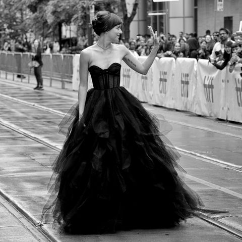 Dakota Johnson looks incredible in a black Dior gown