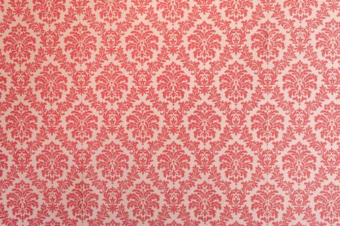red wallpaper vintage flock with red damask design on a white background retro vintage style