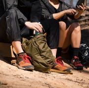 best hiking shoes two people taking a break from hiking