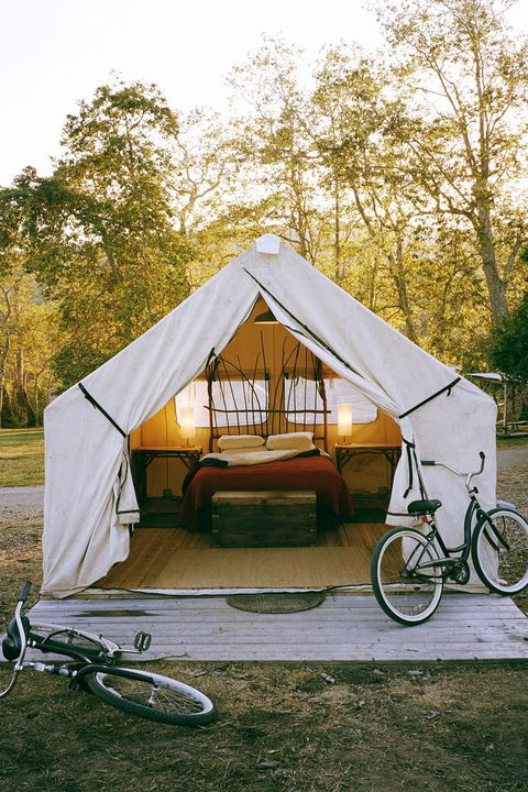 camping tent with bed and bikes
