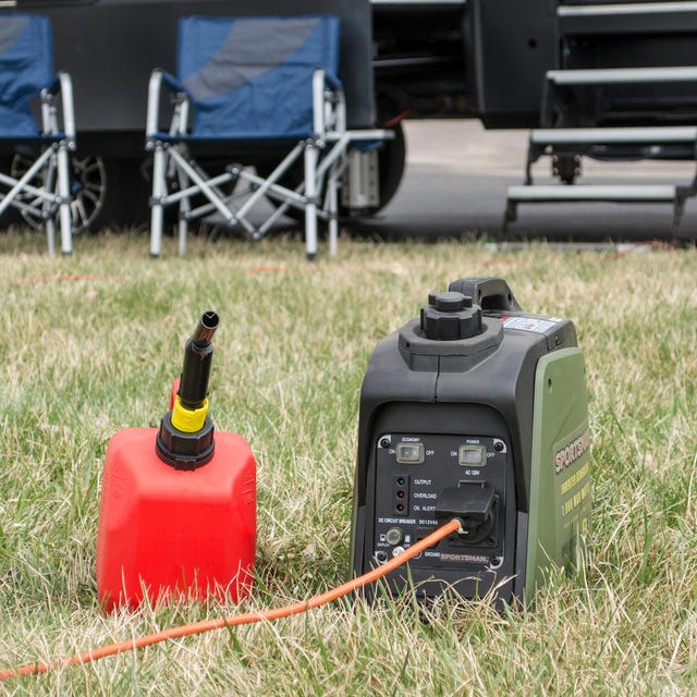 Sportsman 1,000/800-Watt Gasoline Powered Digital Inverter Generator a power generator and a gasoline tank outside