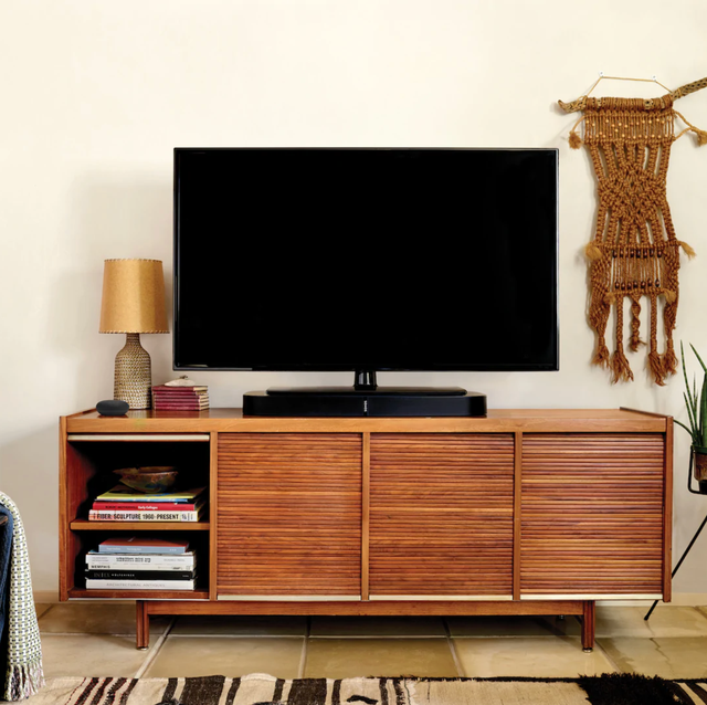 Sonos Playbase a home theater system on a desk in a living room
