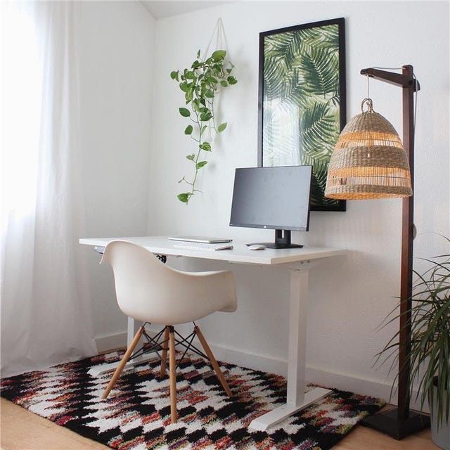 Flexispot Electric Height Adjustable Standing Desk a home office scene