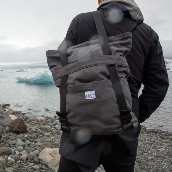 November-2-Deals-Not-To-Miss-Lead a model with a backpack near icebergs