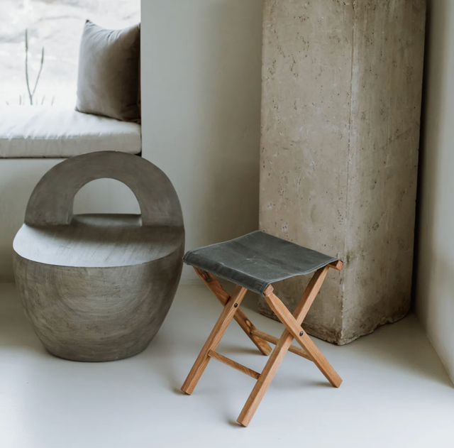 a camp stool and other furniture