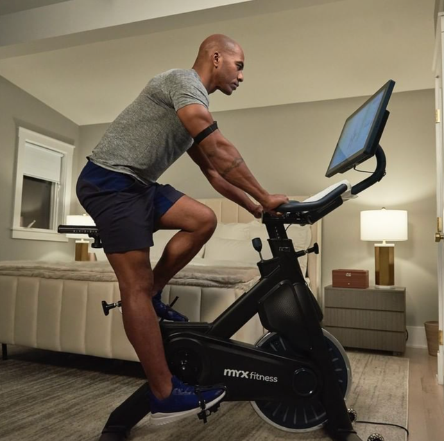 MyxFitness a model using an exercise bike