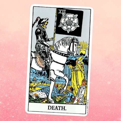 the death of the tarot card, showing a skeleton in armor riding a white horse, carrying a black flag showing a white flower a man in clerical robes and two children stand in front of the skeleton