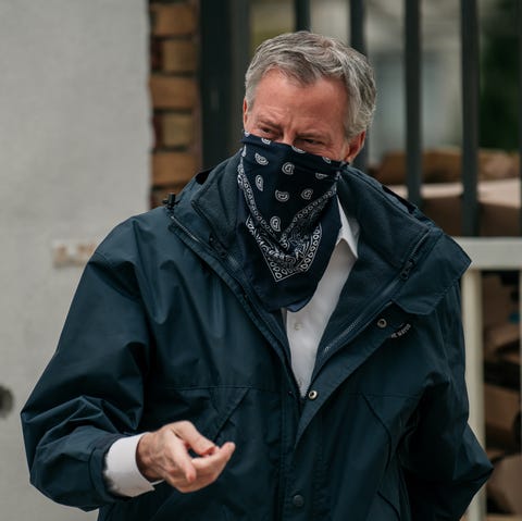 New York City Mayor De Blasio Visits A Food Pantry During Coronavirus Pandemic new york, ny april 14 new york city mayor bill de blasio wears a bandana over his face while speaking at a food shelf organized by the campaign against hunger in bed stuy, brooklyn on april 14, 2020 in new york city before touring the facility de blasio praised the work of food shelves and community organizations across new york city to combat hunger during the ongoing coronavirus crisis photo by scott heinsgetty images