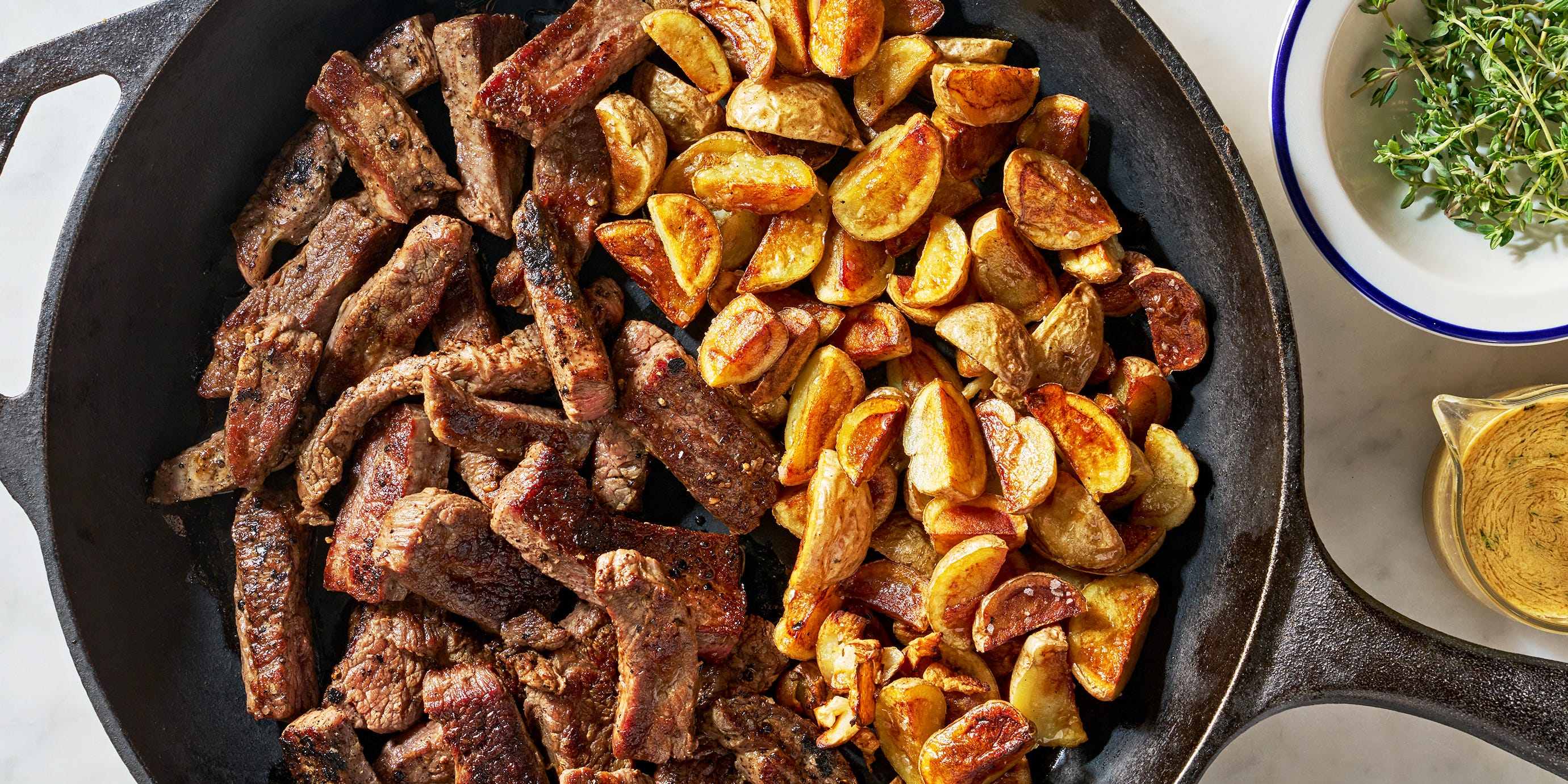 The Herby Sauce On This Steak & Potato Skillet Will Blow Your Mind