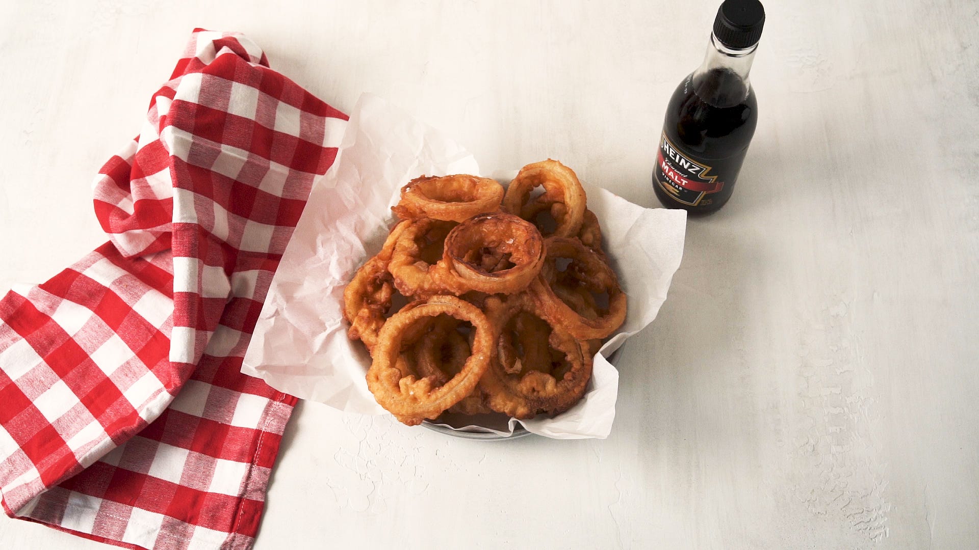 Salt & Vinegar Onion Rings Are A Unique Upgrade On The Iconic Side Dish