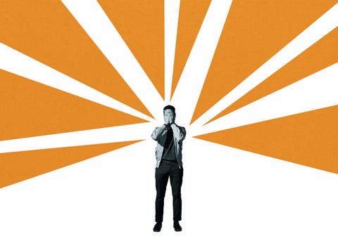 Depressed man covering face amidst orange rays depressed man covering face amidst orange rays