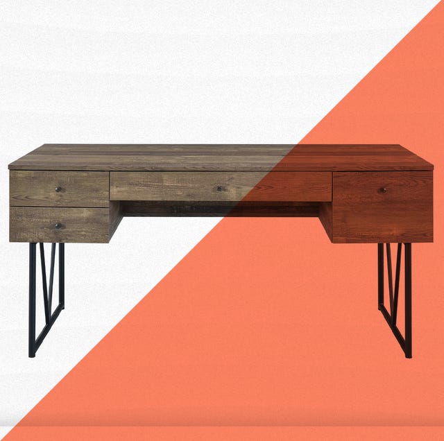 wooden home office desk against orange and white background