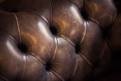 Detail of a luxurious brown leather sofa