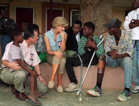 Princess Dianas 1997 Trip To Angola To Advocate Against Landmines In Photos