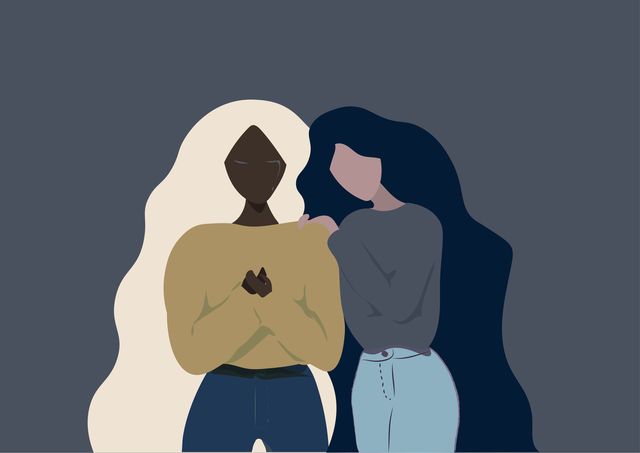 different ethnicity girl friends long hair helping each other when one of them is crying on a grey  blue background