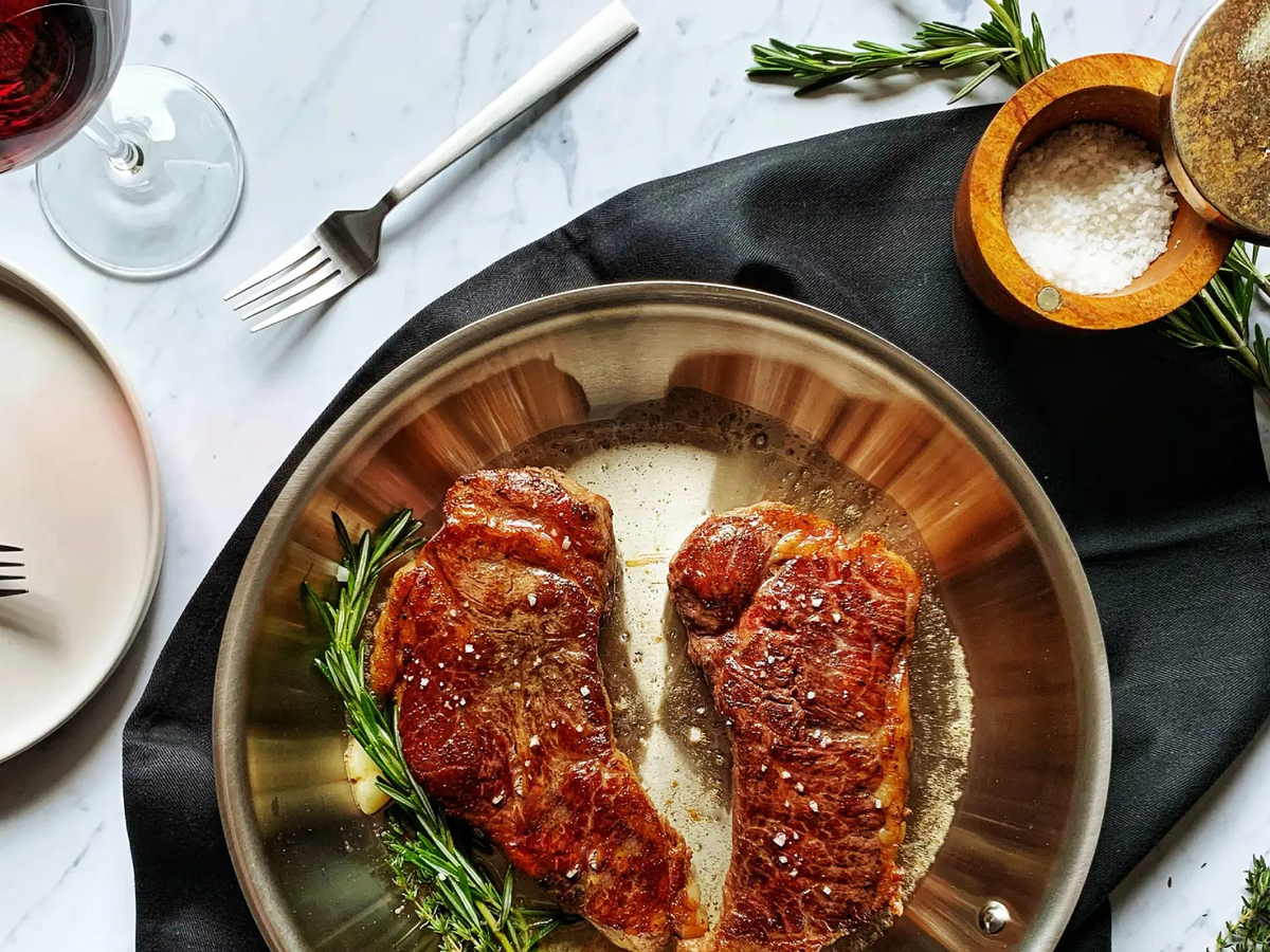 https://hips.hearstapps.com/hmg-prod.s3.amazonaws.com/images/digital-all-clad-d3-stainless-12-in-fry-pan-seared-steak-65255fc9318ca.png?crop=1xw:0.75xh;center,top&resize=1200:*