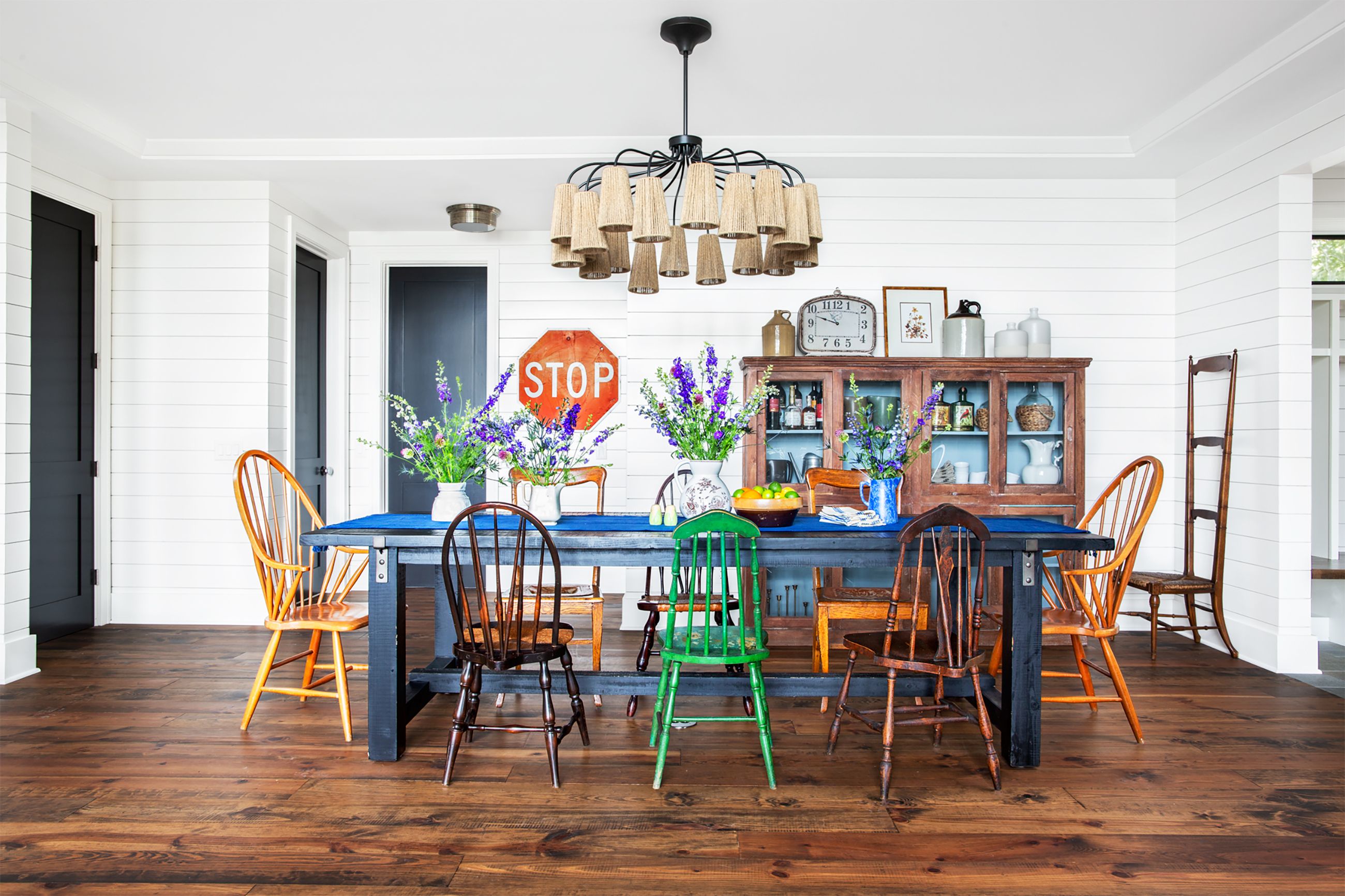 large circular dining table and chairs