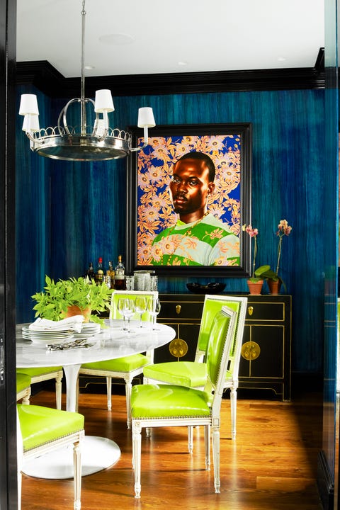 dining room with kehinde wiley painting