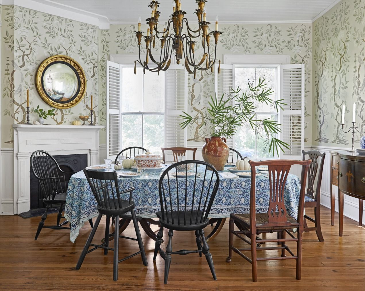 round dining table with mixed chairs