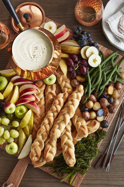 threecheese fondue with cableknit breadsticks