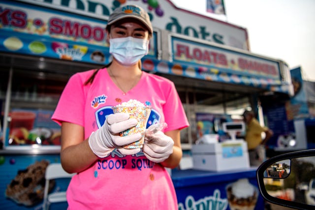 scenes from the first oc fair food drive thru event