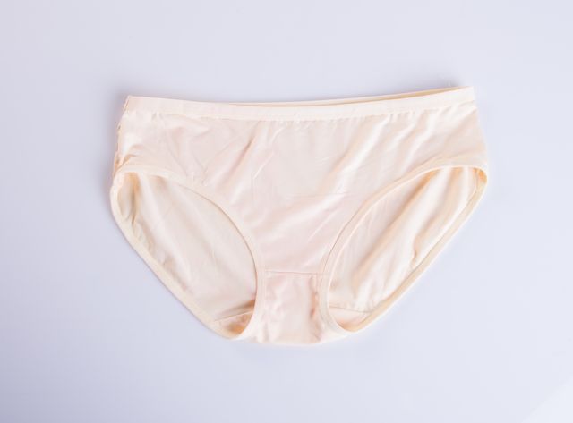 directly above shot of panties over white background