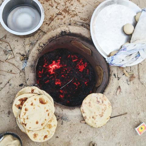 Directly Above Shot Of Roti By Oven In Village